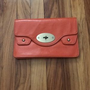 Orange with gold clasp clutch